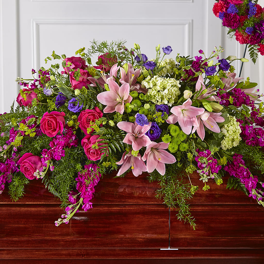 Radiant Tribute Casket Spray – East City Flower Shop, Peterborough ON
